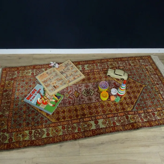 Tapis d'orient ancien en laine fait main - Le palais des bricoles